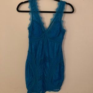 Very sexy turquoise lace Bebe dress